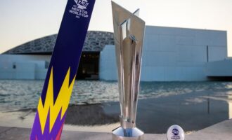 T20 World Cup trophy displayed outdoors.