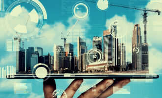 City skyline with construction and digital real estate concept