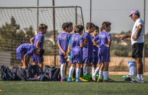 The Role of Coaches in Building Championship Teams