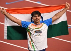 Neeraj Chopra with the Indian Flag