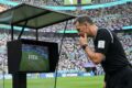 Referee Checking the VAR Monitor