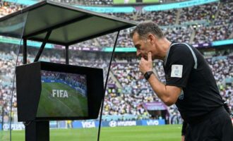 Referee Checking the VAR Monitor